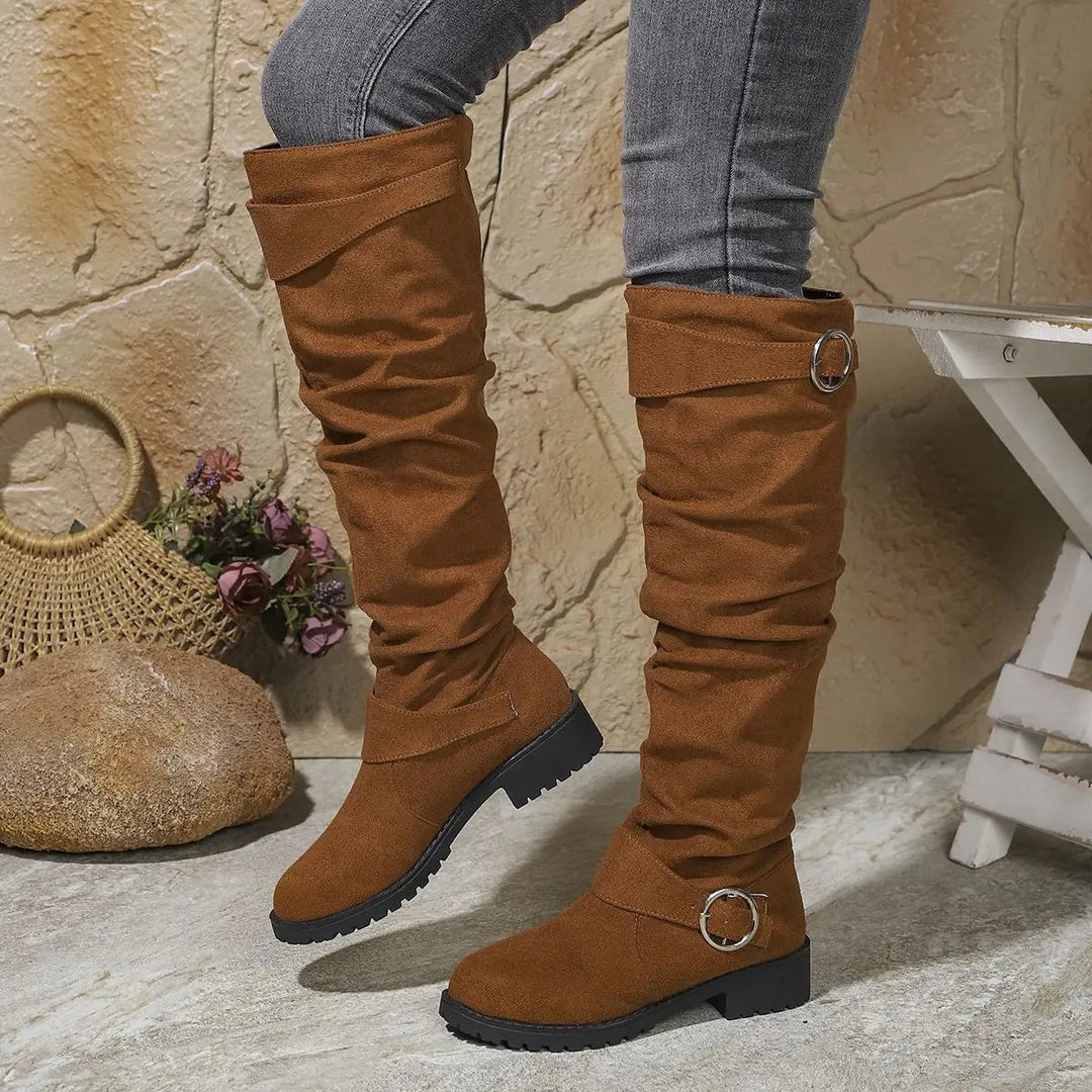 Close-up of Wyn knee high boot toe and shaft detailing in light grey