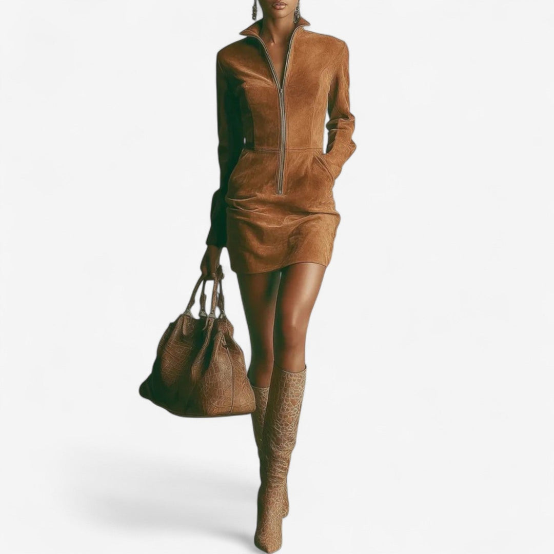 Woman wearing a brown zip-up midi dress with a sleek front zipper, styled for a casual day look