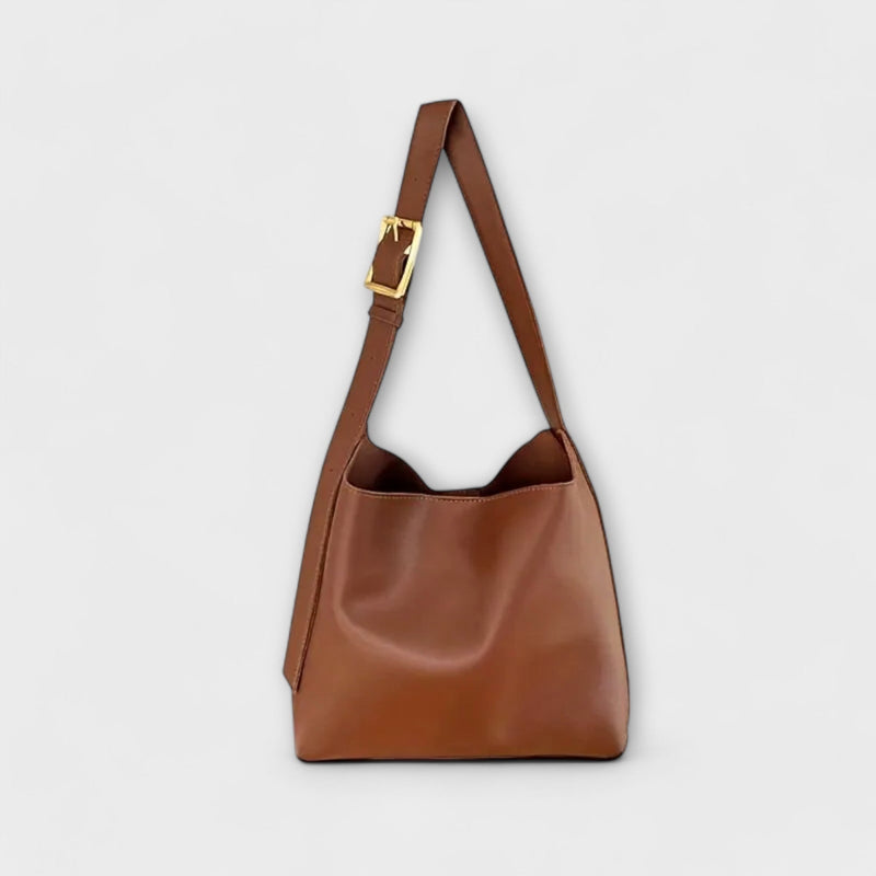 Yrla classic shoulder bag in brown with adjustable strap, shown from the front