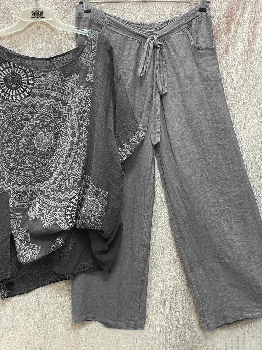 Front view of the Zahara mandala print co-ord set in gray showing the relaxed wide-leg trousers and bold tonal print top