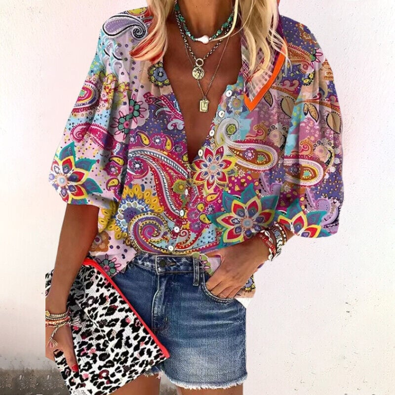 Front view of a pink boho print V-neck button-down blouse showing floral medallion pattern
