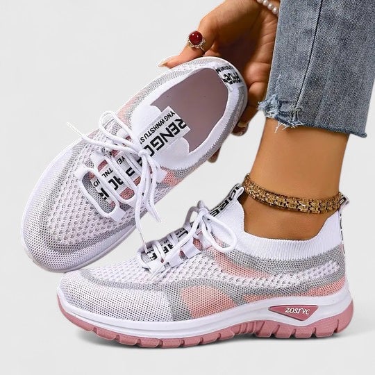 Sole view of women's chunky cushioned sneakers showing structured rubber outsole