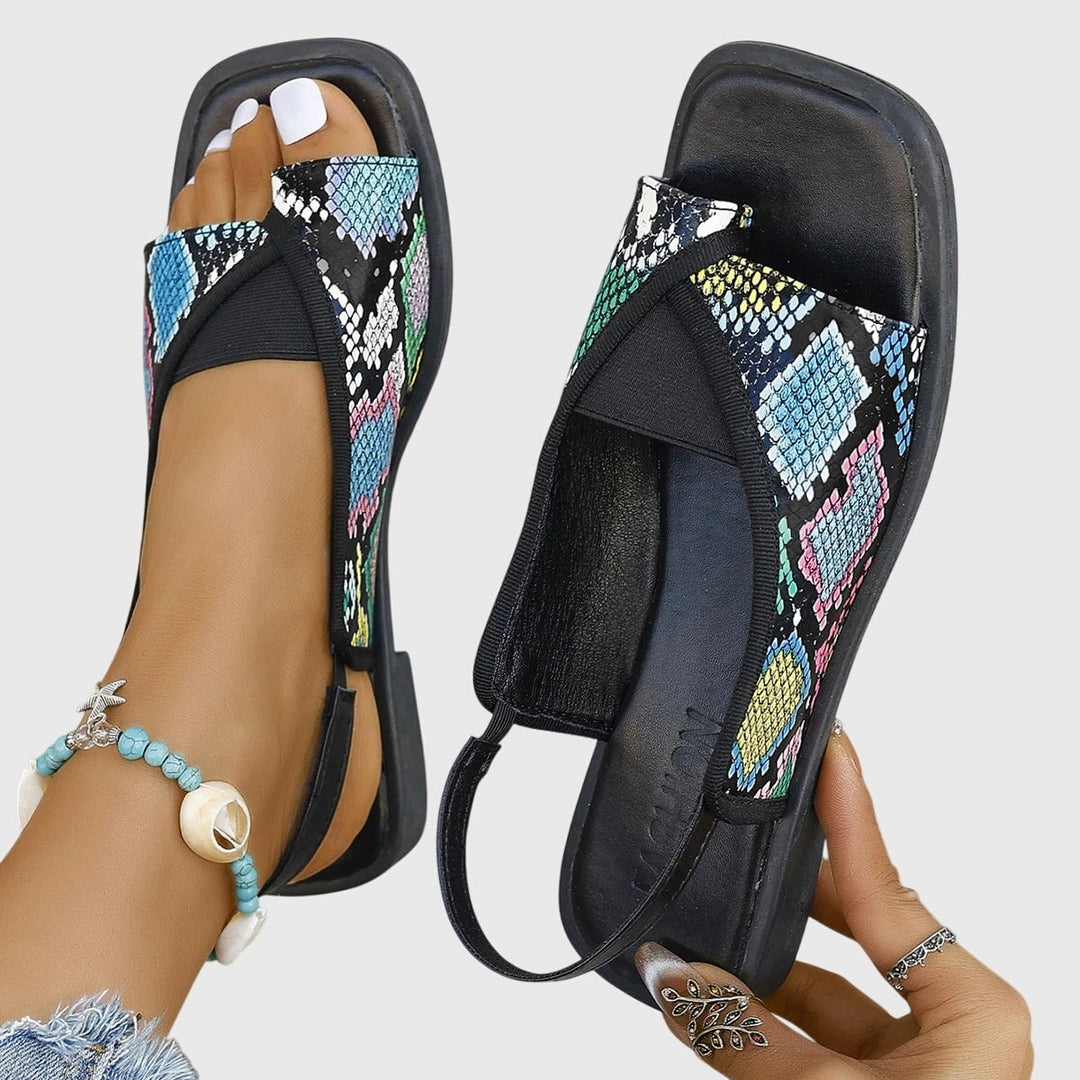 Multicolor square toe slip-on flat sandals for women with colorblock upper and flat sole, top-down view
