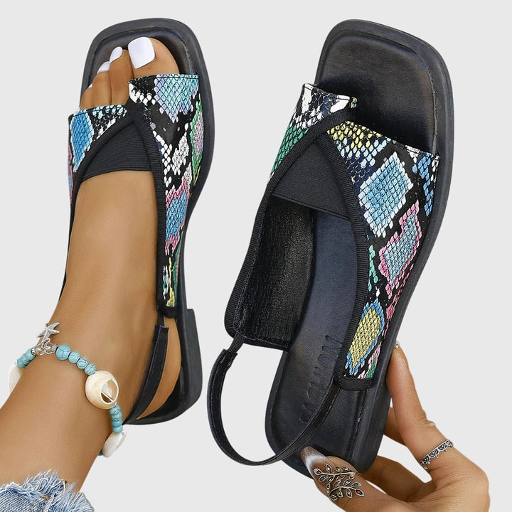 Multicolor square toe slip-on flat sandals for women with colorblock upper and flat sole, top-down view