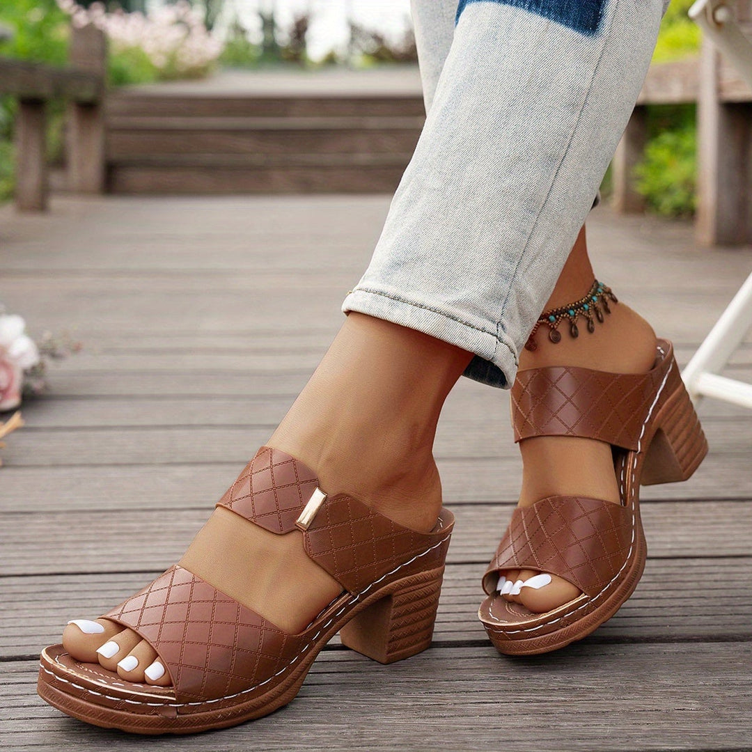 Zelda women's sandal in black, front three-quarter view