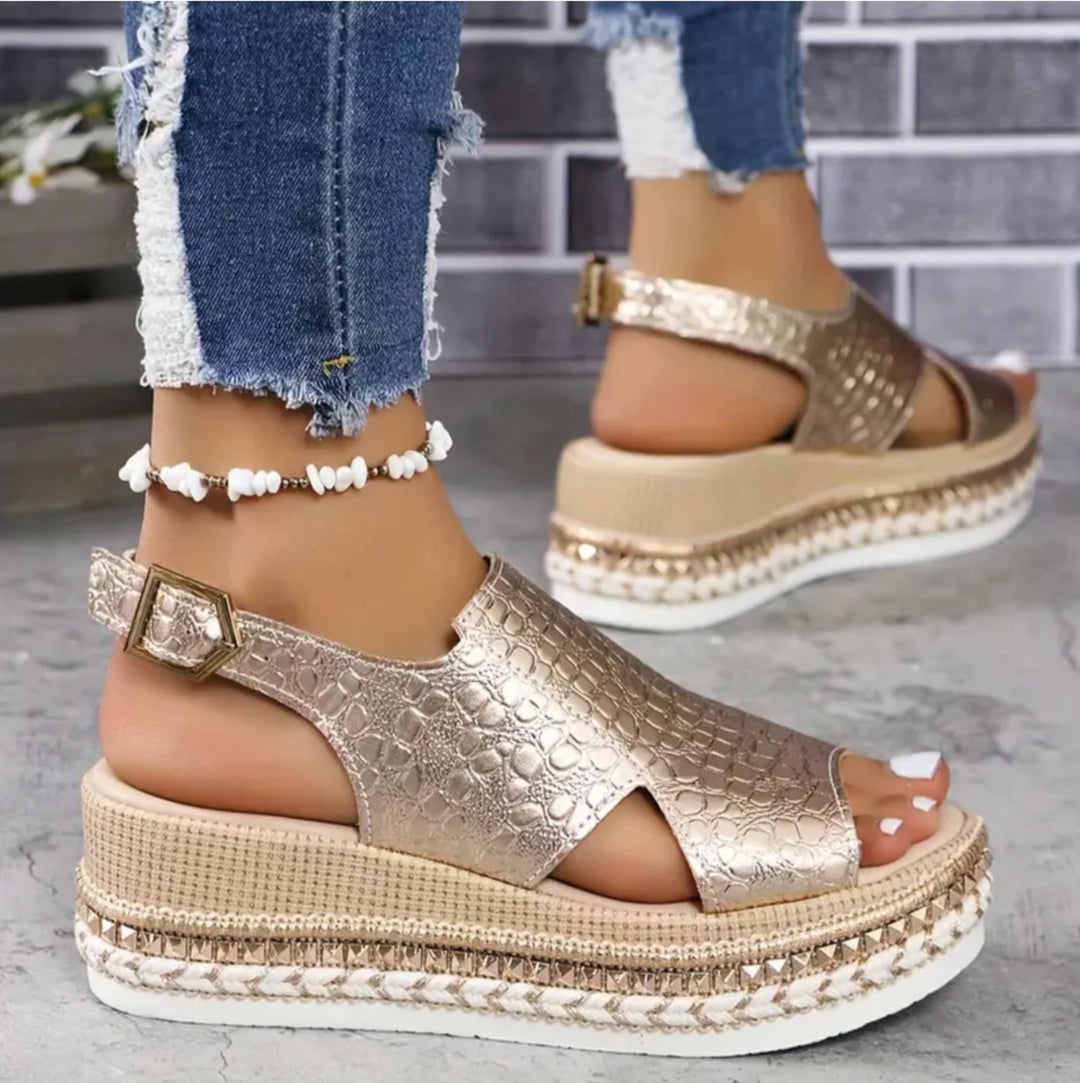 Zinnia women's orthopedic cushioned sandals in silver, front view with adjustable strap detail