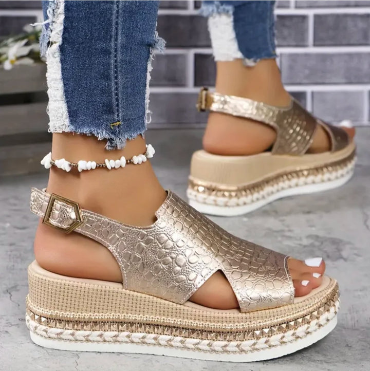 Zinnia women's orthopedic cushioned sandals in silver, front view with adjustable strap detail
