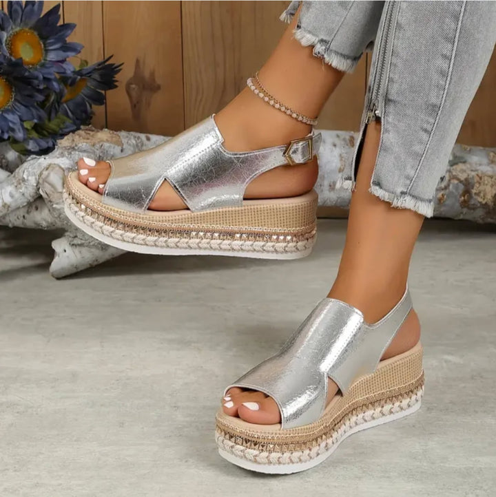 Zinnia silver orthopedic sandals on a model showing fit and adjustable strap closure