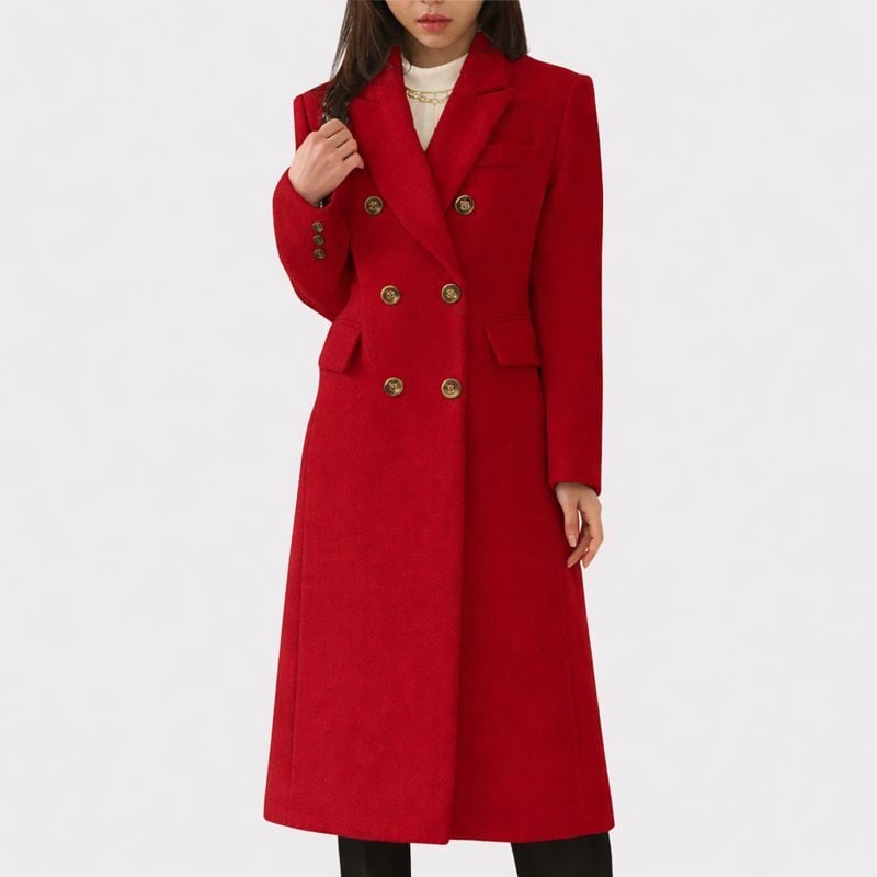 Side profile of the Ziva cozy overcoat in dark green highlighting the elegant tailored cut