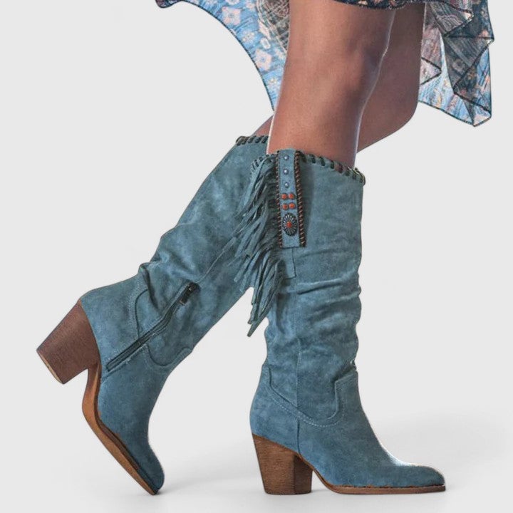 Zoey orthopedic boot styled with straight-leg jeans on a woman walking outdoors